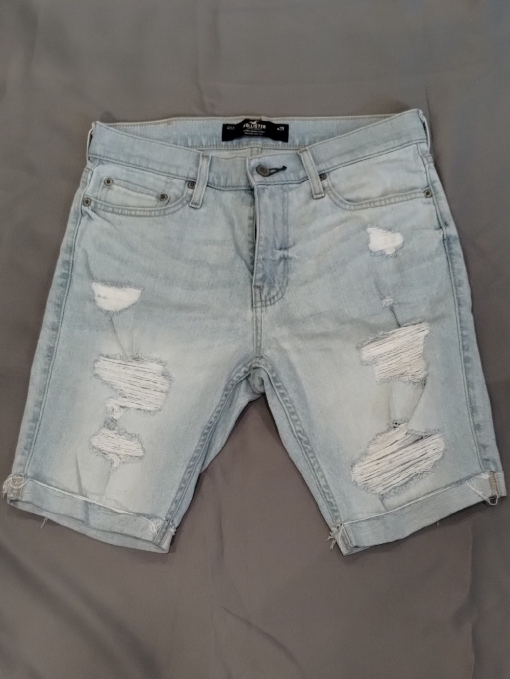 Hollister Light Wash Distressed Denim Shorts.   (70)